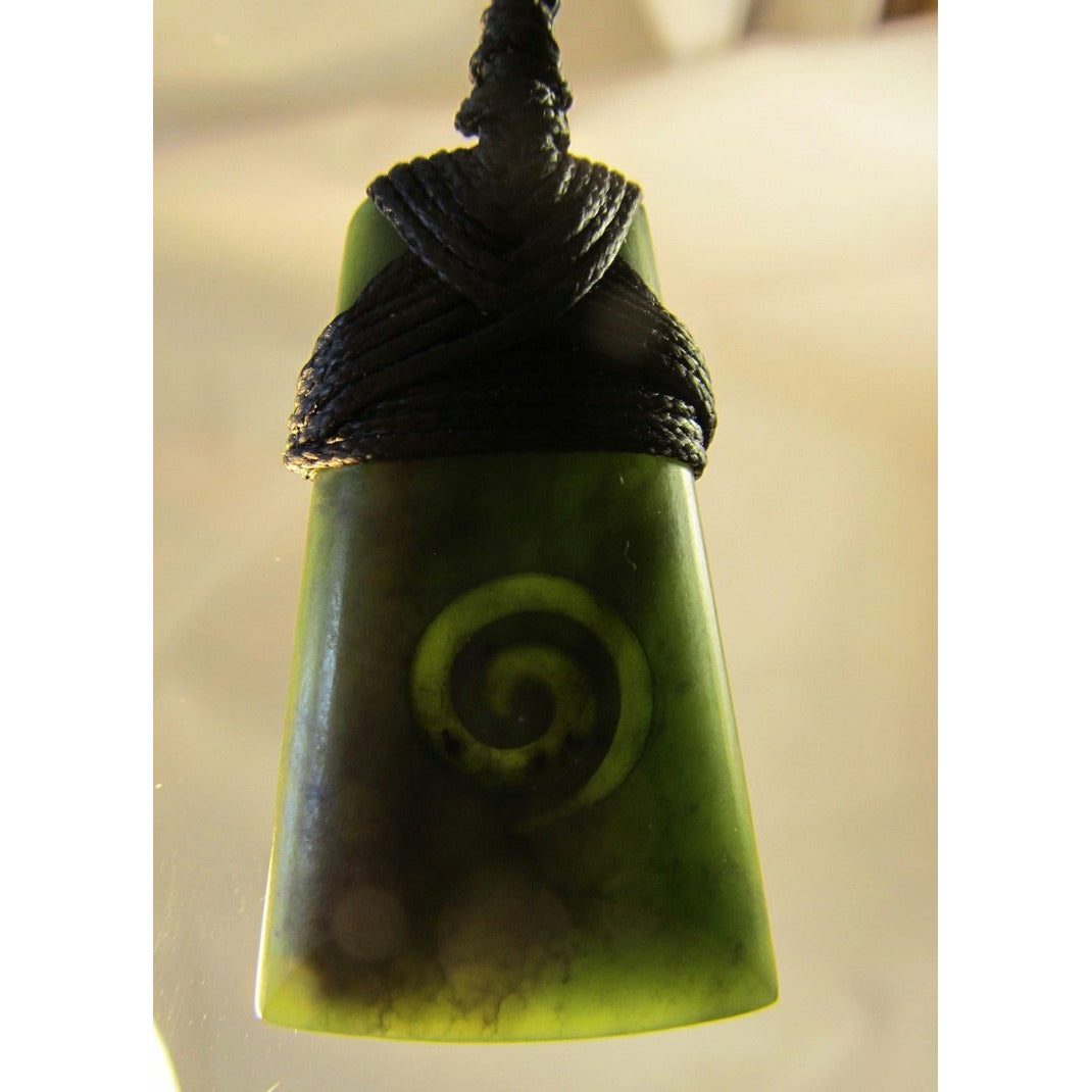 Carved Koru Greenstone - 40mm Not specified